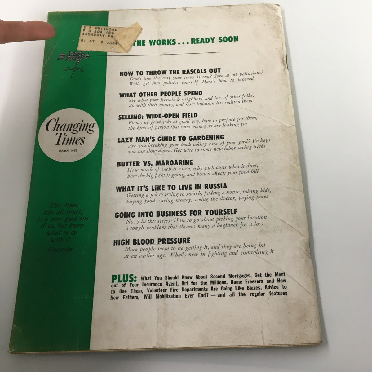 Back cover of VTG Changing Times Magazine March 1952 showcasing additional articles and a vintage label indicating previous ownership.