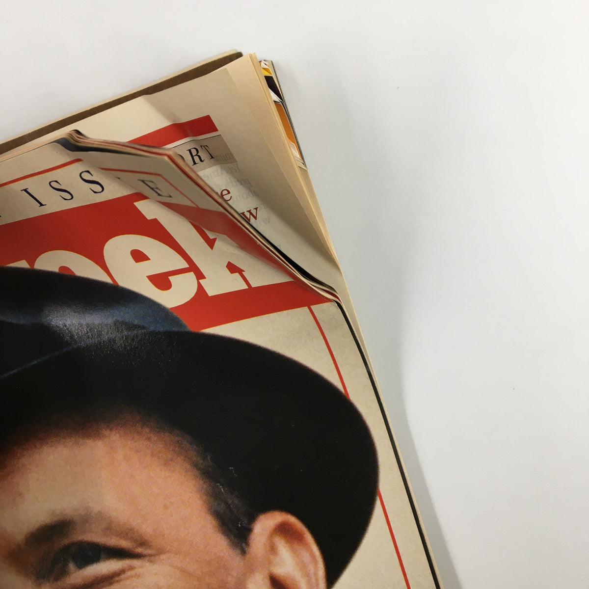 Detail of the edge of the May 25, 1998, Newsweek Magazine showing a worn corner, emphasizing its collectible nature and homage to Frank Sinatra.
