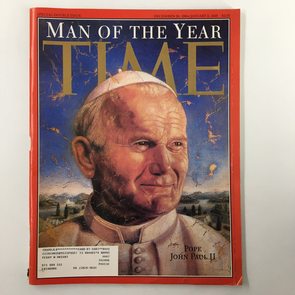 Cover of Time Magazine dated December 26, 1994, featuring Pope John Paul II as Man of the Year. The magazine showcases a portrait of the Pope against a scenic backdrop, highlighting his significance as a cultural icon.