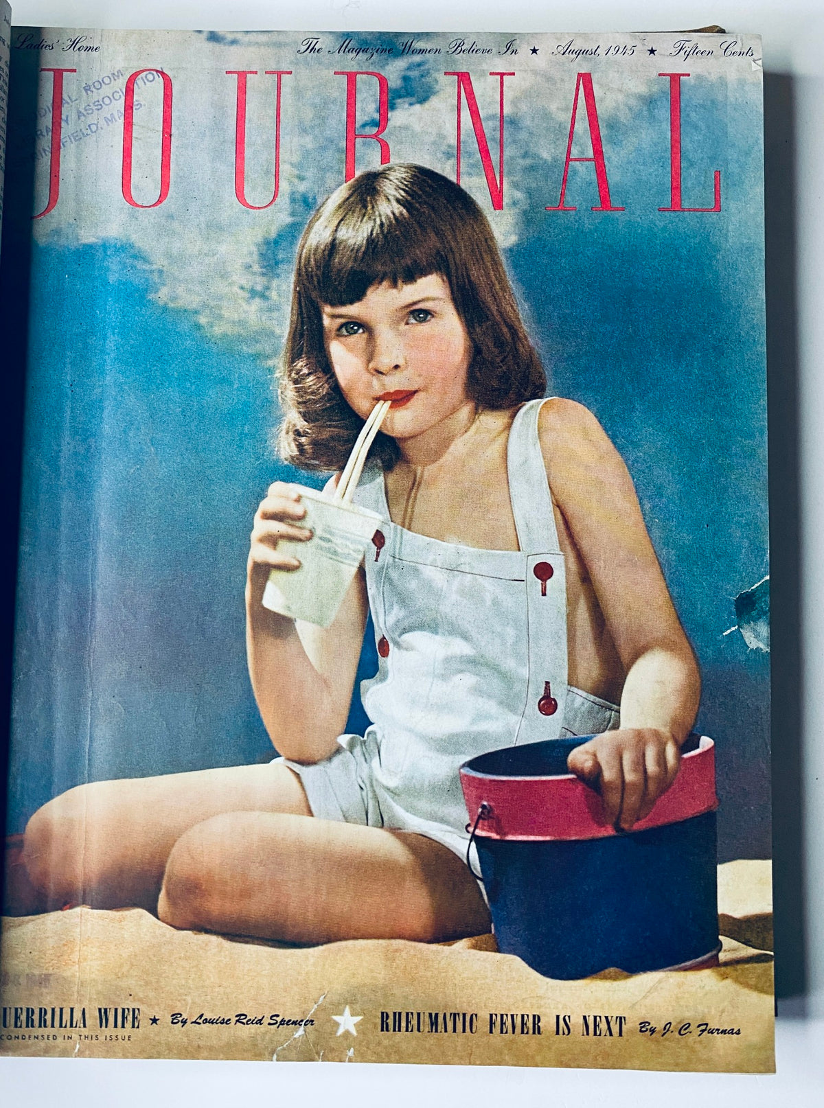 Cover of Ladies' Home Journal Bound Magazine for August 1945, depicting a young girl sipping a drink, representing American childhood in the post-war era.