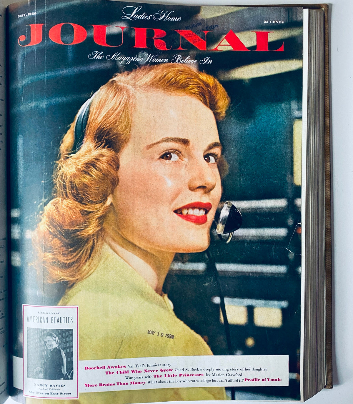 Cover image of Ladies' Home Journal, May 1950 edition. Showcases a woman on the phone, representing the themes of family and home life in the 1950s. This is part of the Ladies' Home Journal Library Bound Magazine 1950 full year collection, January - December.
