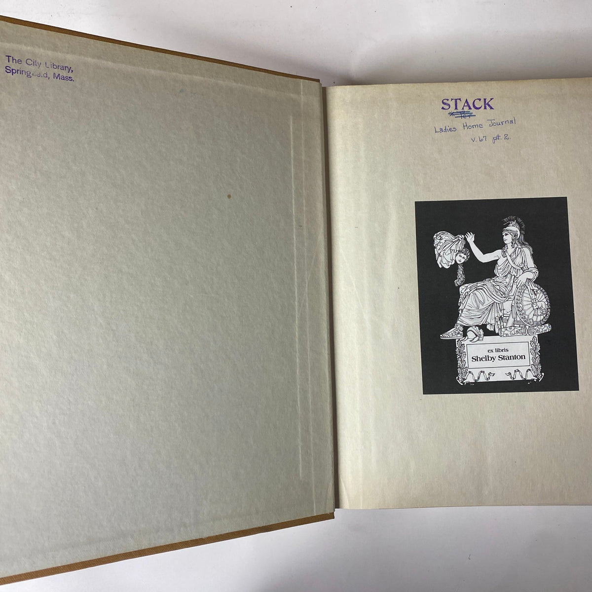 Inside cover of the Ladies' Home Journal Bound Magazine 1950, featuring an ex libris illustration and library stamp, showcasing the volume's attribution.