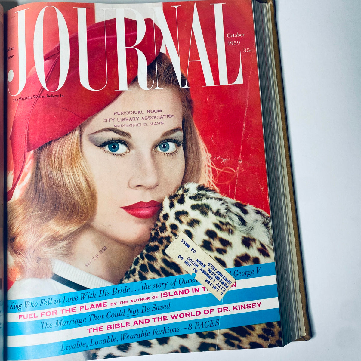 Ladies' Home Journal Bound Magazine October 1959 cover displaying a woman with bold red lipstick and a red hat, epitomizing 1950s glamour.