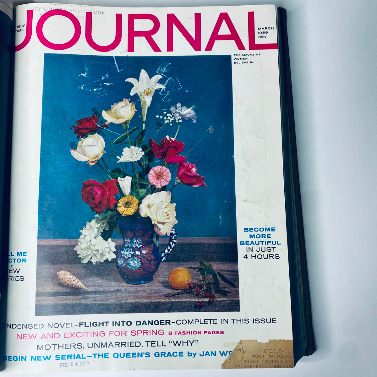March 1959 cover of Ladies' Home Journal Bound Magazine showcasing a vibrant floral arrangement, indicative of spring themes in fashion and lifestyle during the era.