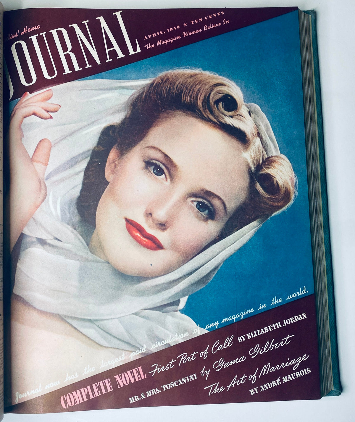 Cover of Ladies' Home Journal April 1940, showcasing a glamorous woman in traditional attire, representing beauty ideals from the 1940s in period magazines.