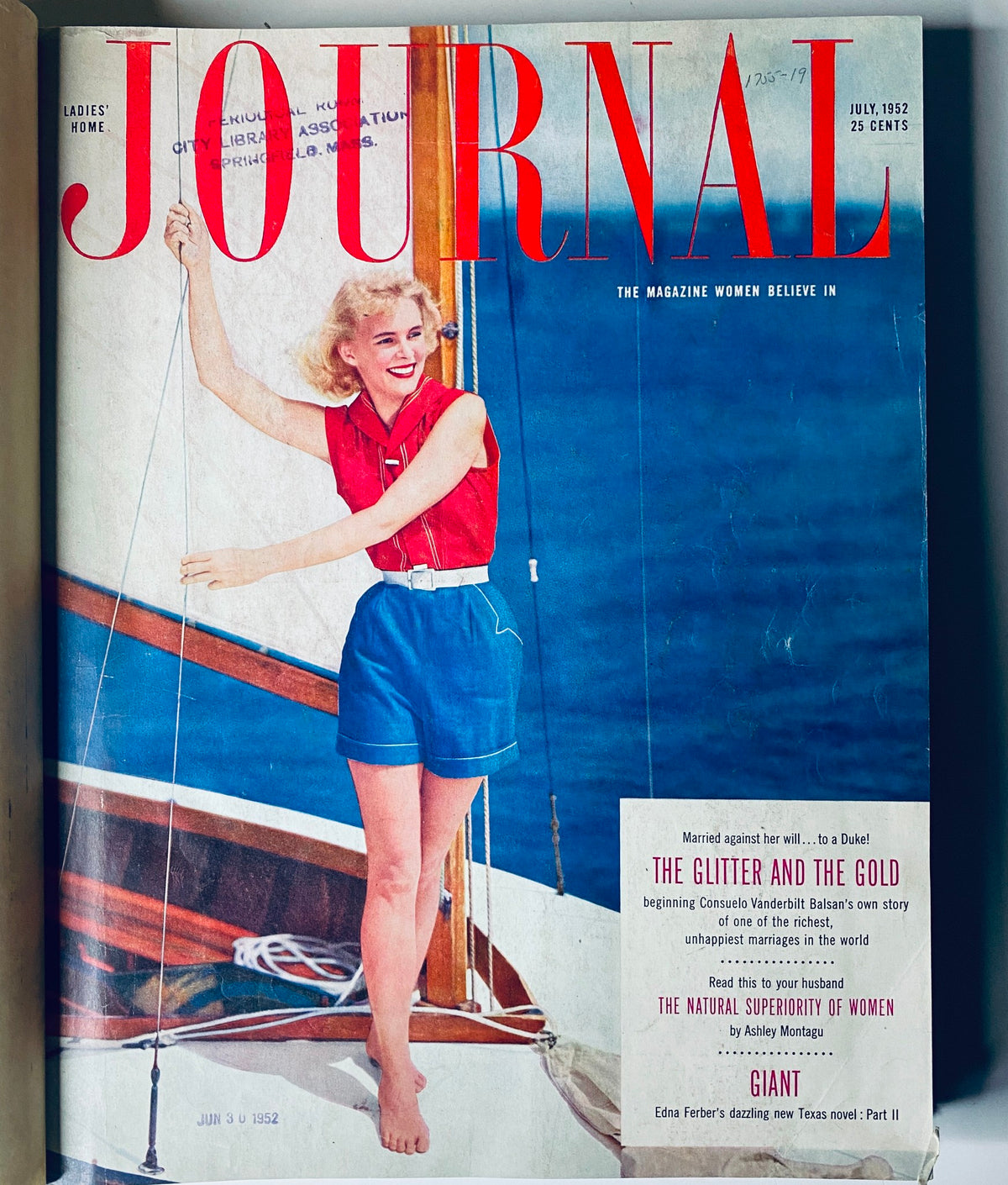 Cover of Ladies' Home Journal, July 1952, displaying a woman on a sailboat, exuding happiness and youth, highlighted by vibrant colors.