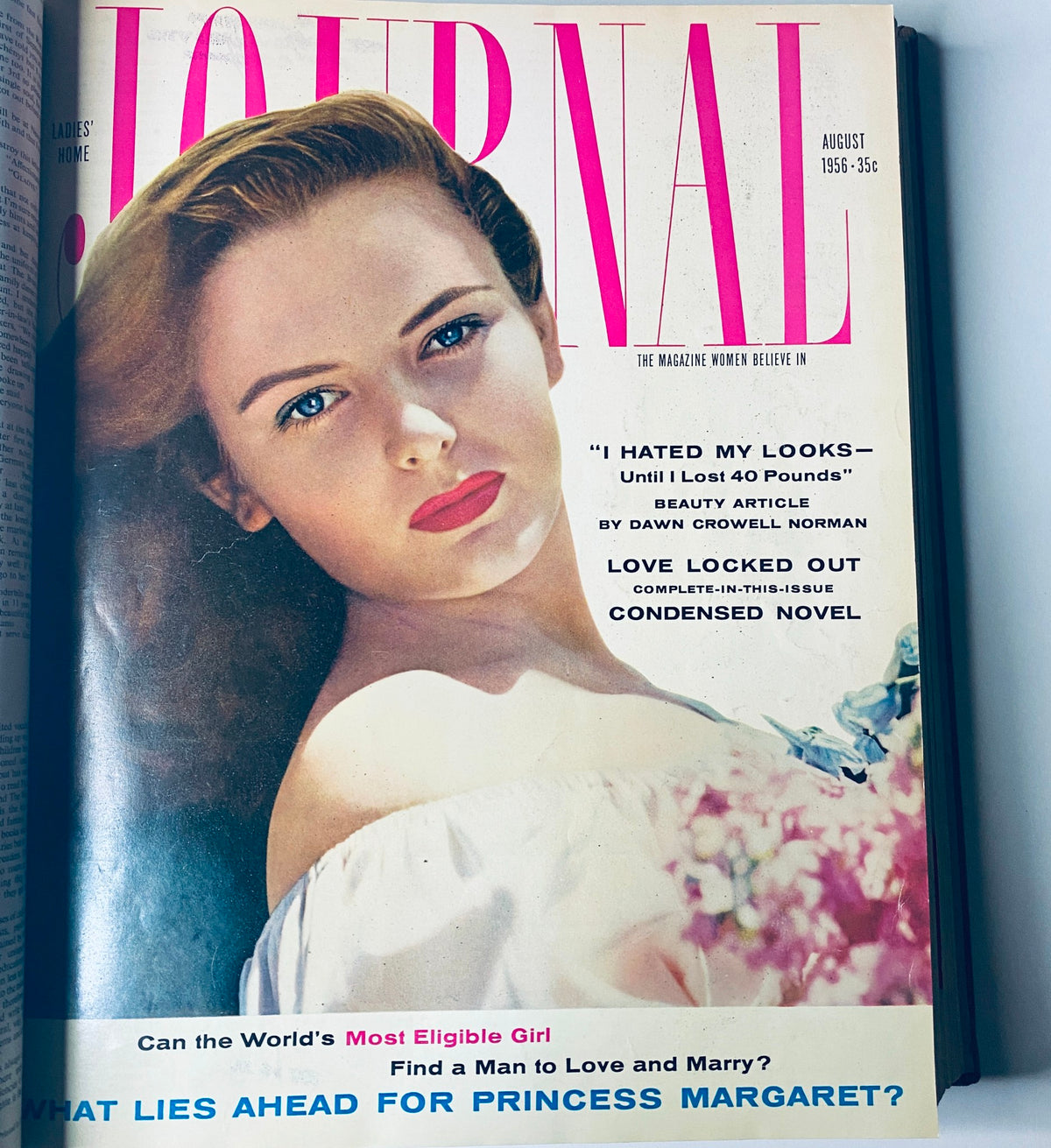 Ladies' Home Journal Library Bound Magazine 1956 Full Year January - December - August 1956 issue cover showcasing a glamorous woman with makeup and elegant attire, reflecting vintage beauty standards.