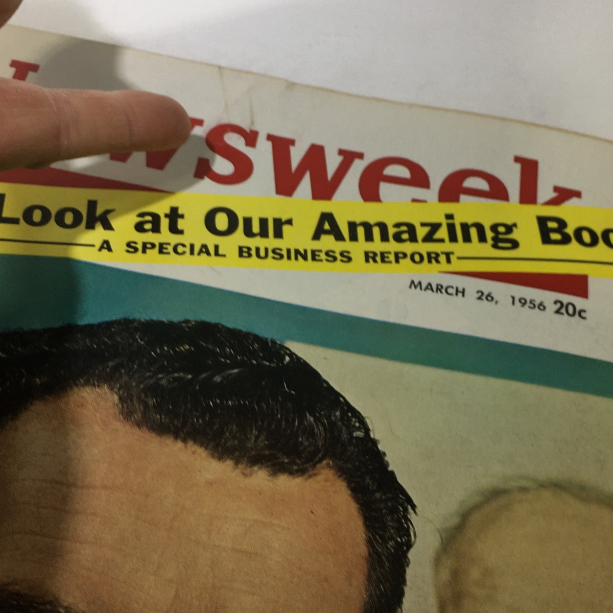 Close-up of the cover of the March 26, 1956 issue of Newsweek Magazine, featuring a unique label reading 'New Look at Our Amazing Boom' with Vice President Nixon's image.