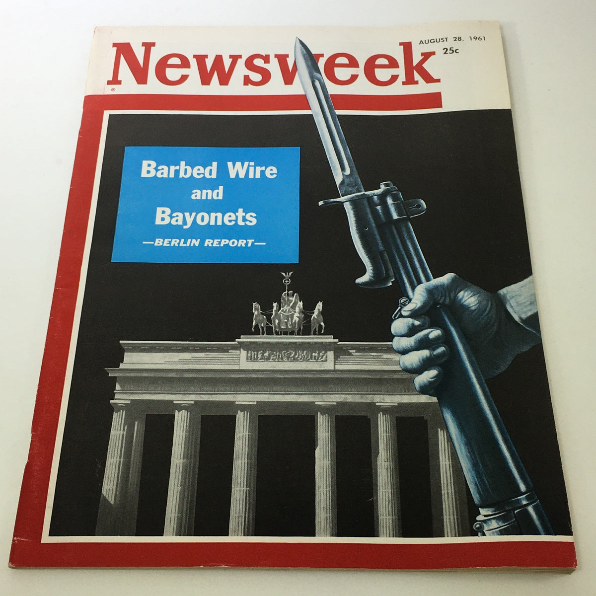 Vintage Newsweek magazine cover from August 28, 1961, featuring the title 'Barbed Wire and Bayonets' with a depiction of a bayonet held over the Brandenburg Gate. This issue includes the Berlin Report and reflects key historical themes.