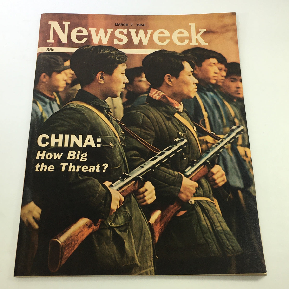 VTG Newsweek Magazine March 7 1966 cover featuring the title 'China: How Big the Threat?' with images of historical figures holding rifles, reflecting mid-20th-century global politics.