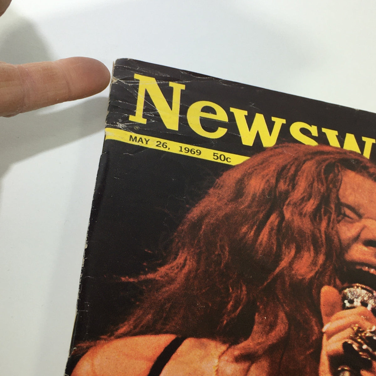 Close-up view of the VTG Newsweek Magazine from May 26, 1969 featuring Janis Joplin on the cover, showcasing the magazine's title and publication date. The image highlights some visible wear and tear, emphasizing its vintage character.