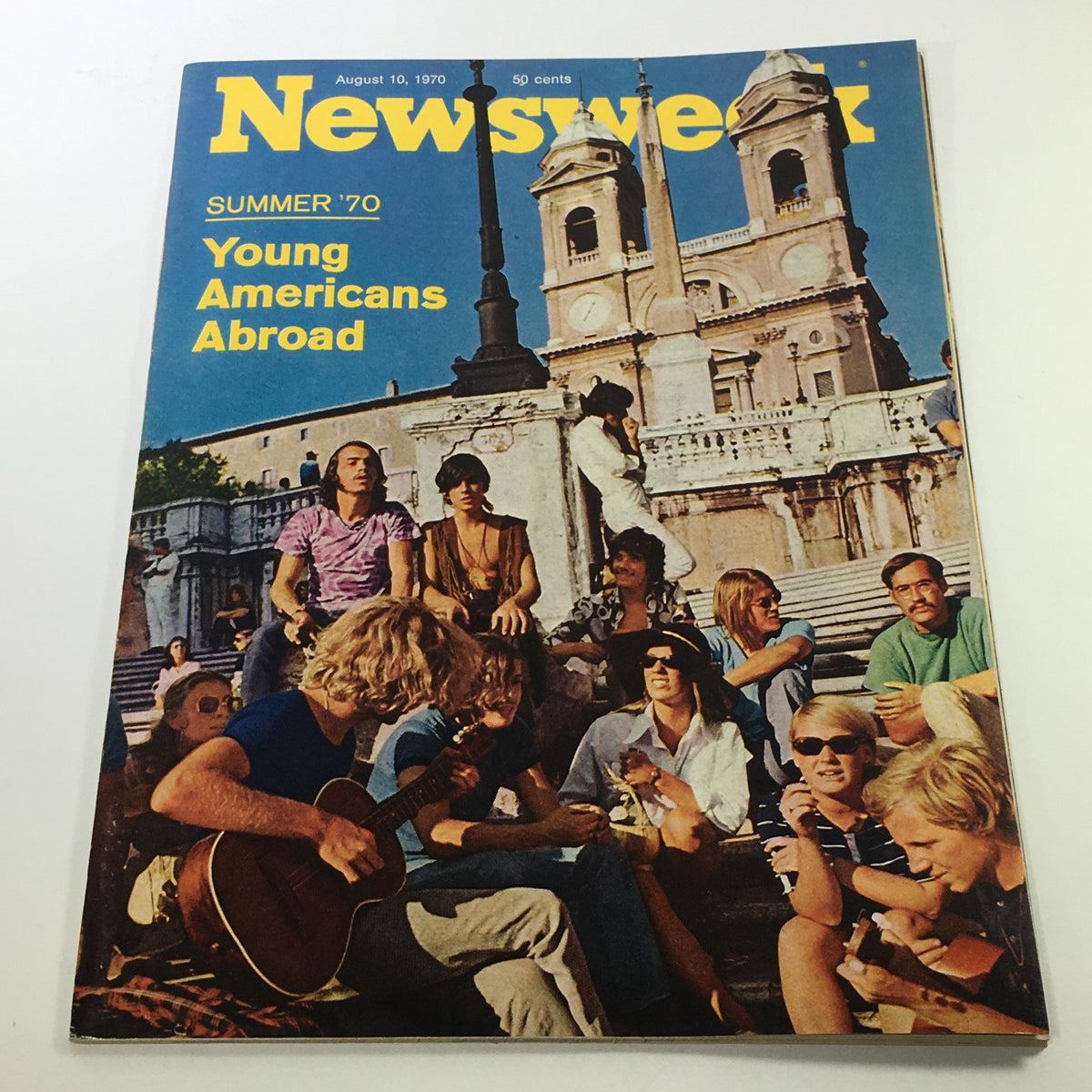 Cover of VTG Newsweek Magazine August 10 1970 featuring the theme 'Young Americans Abroad,' depicting a group of young individuals in relaxed poses, showcasing the cultural essence of the 1970s.