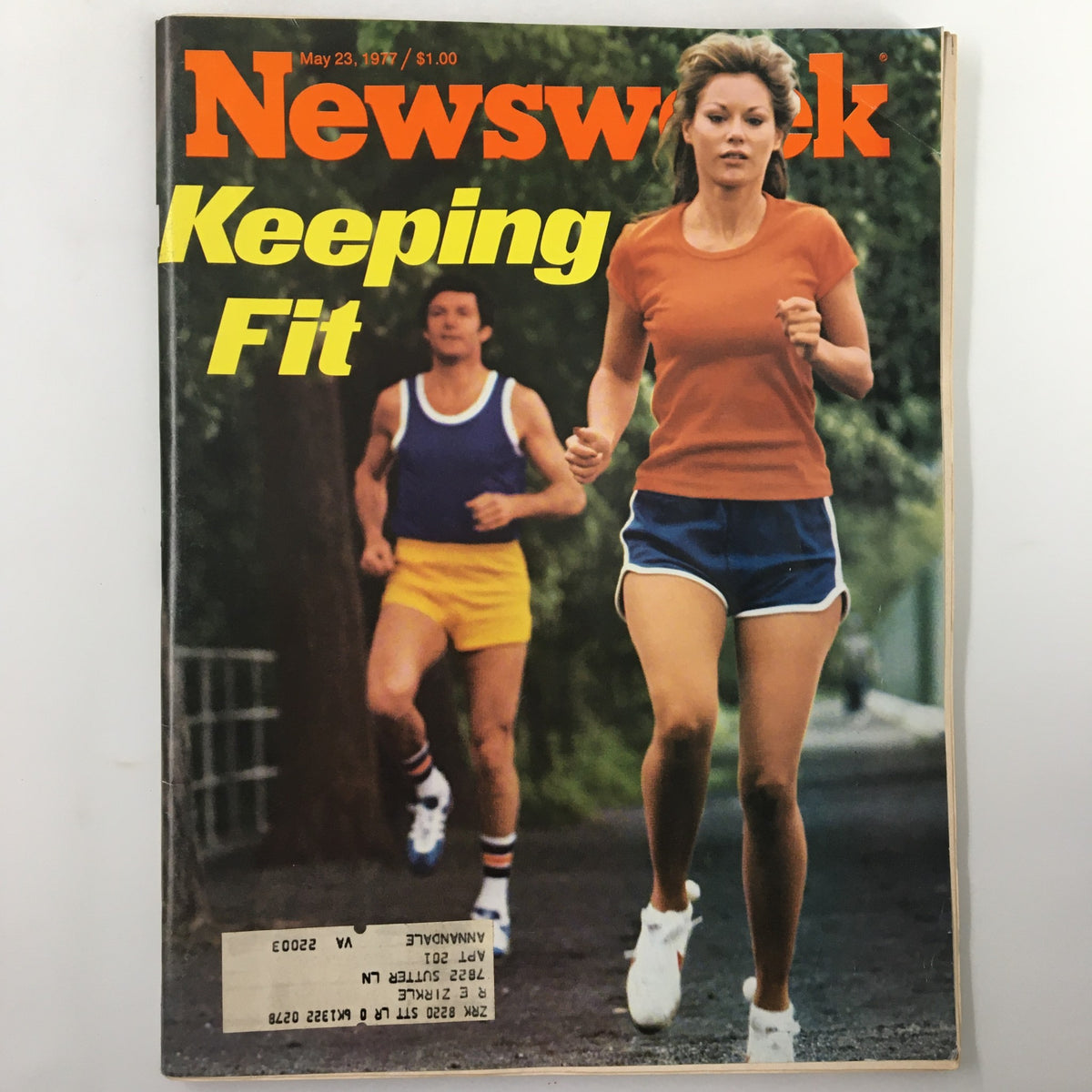 VTG Newsweek Magazine May 23 1977 cover featuring a woman jogging in orange and blue athletic wear with a man in the background, highlighting the theme of Keeping Fit.