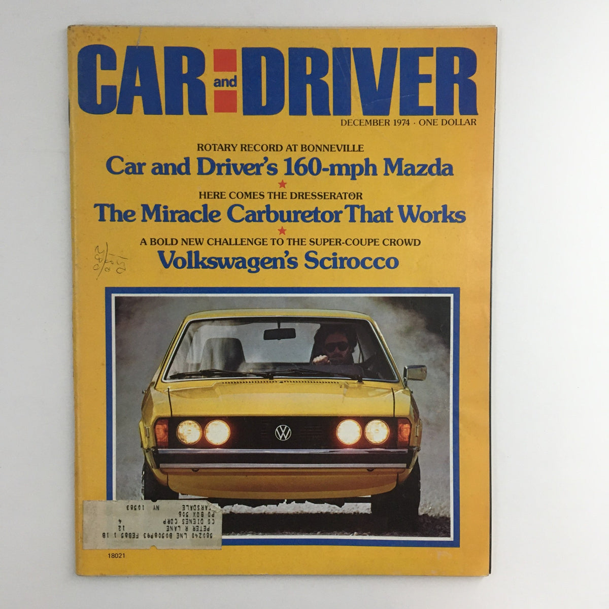 Cover of Car and Driver Magazine, December 1974, featuring the Volkswagen Scirocco with a vintage yellow car photo and automotive headlines.