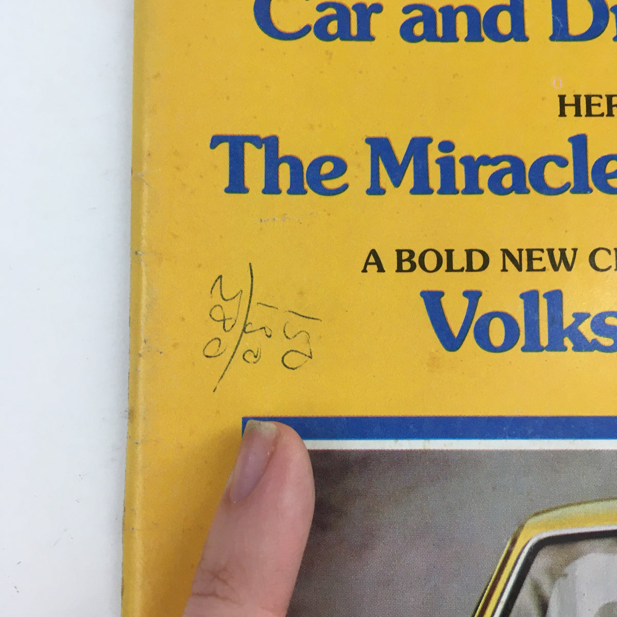 Close-up of the Car and Driver Magazine cover from December 1974, showing details and handwriting on the title featuring Volkswagen's Scirocco.