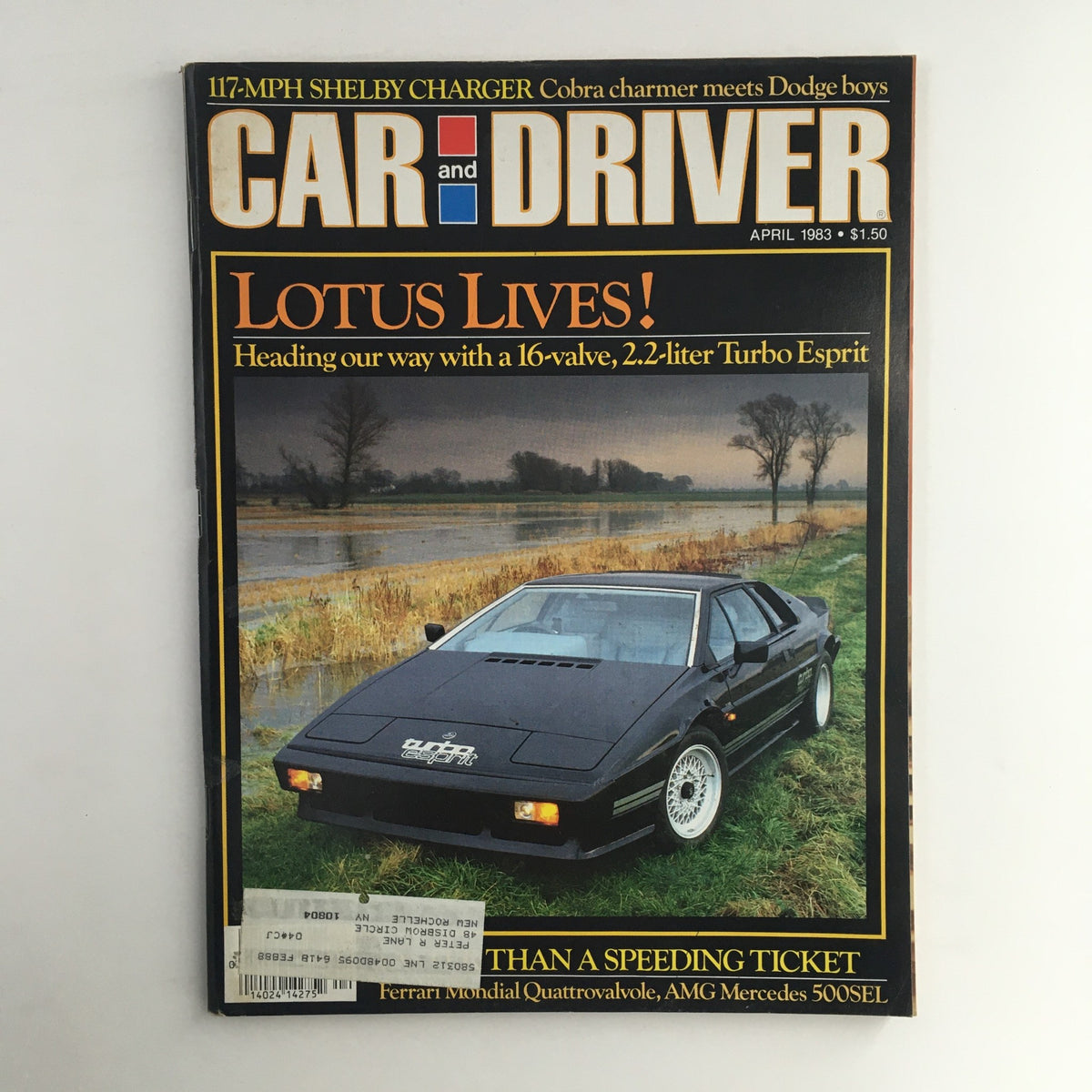Cover of Car and Driver Magazine April 1983 featuring the Shelby Charger and Lotus Turbo Esprit, highlighting automotive excellence and performance with a striking photo of the Lotus Turbo Esprit in a natural setting.