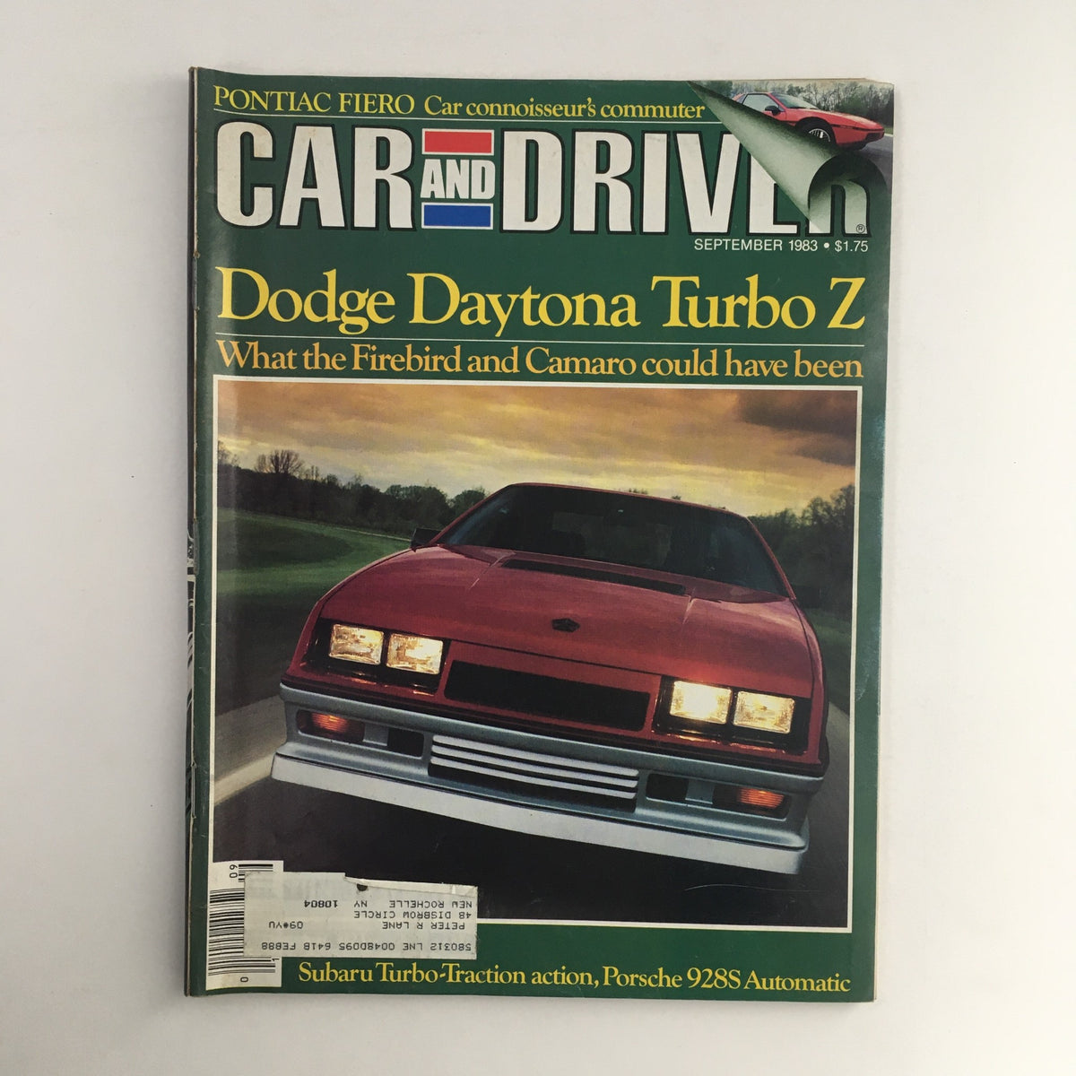 Cover of Car and Driver Magazine from September 1983 featuring the Dodge Daytona Turbo Z, highlighting its performance and design alongside the Porsche 928S AT.