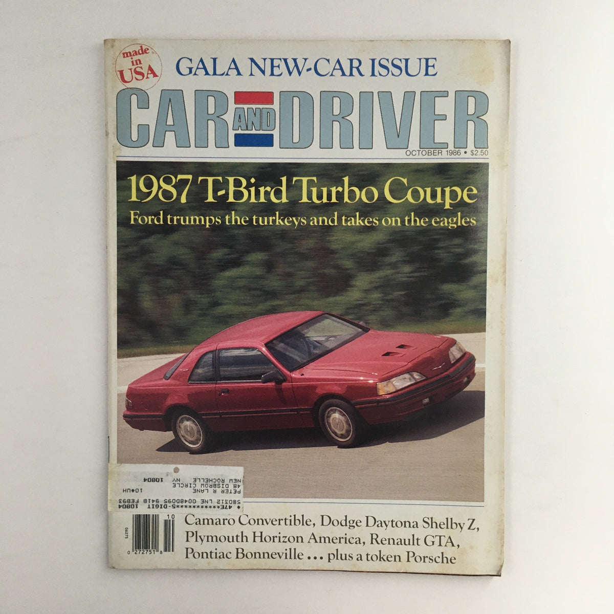 Vintage Car and Driver Magazine October 1986 featuring the 1987 T-Bird Turbo Coupe on the cover. This collectible issue highlights automotive trends and classic car culture of the mid-1980s.