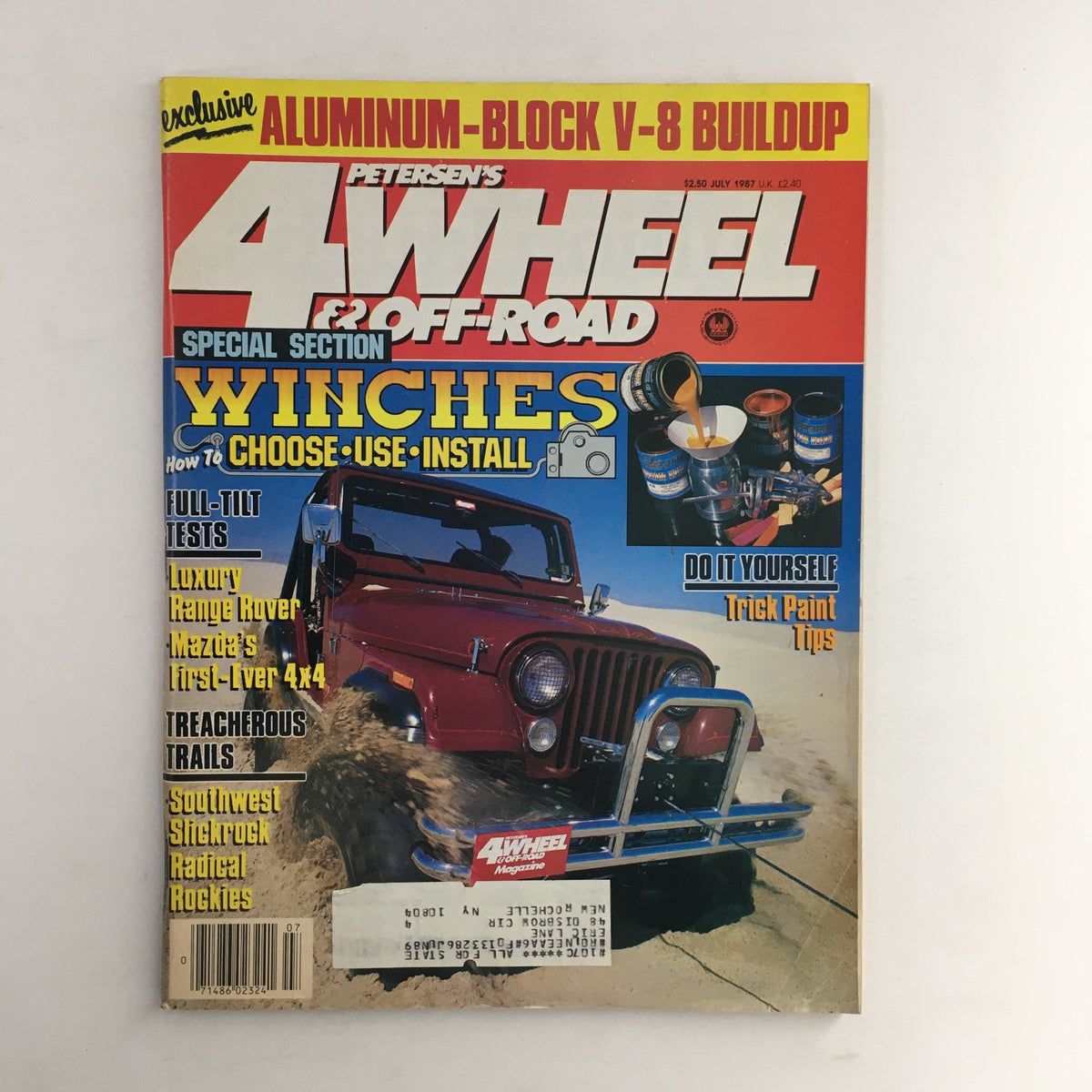 Cover of Petersen's 4 Wheel & Off-Road Magazine July 1987 featuring an off-road vehicle, luxury Range Rover and Mazda 4x4, showcasing a special section on winches.