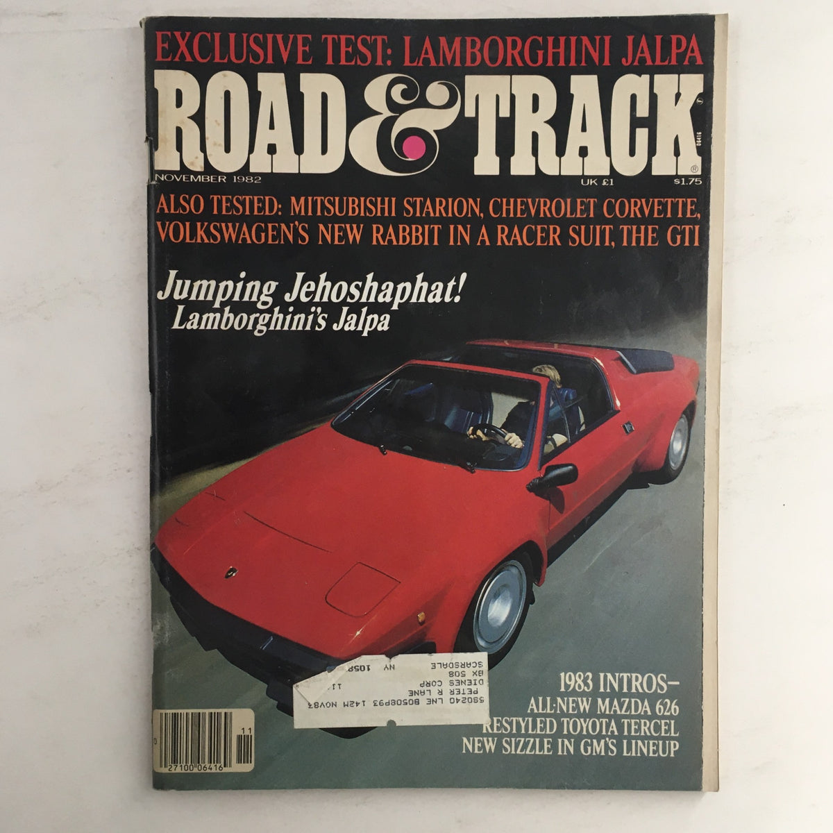 Cover of Road & Track Magazine November 1982 featuring Lamborghini Jalpa and Mitsubishi Starion, showcasing automotive performance and style.