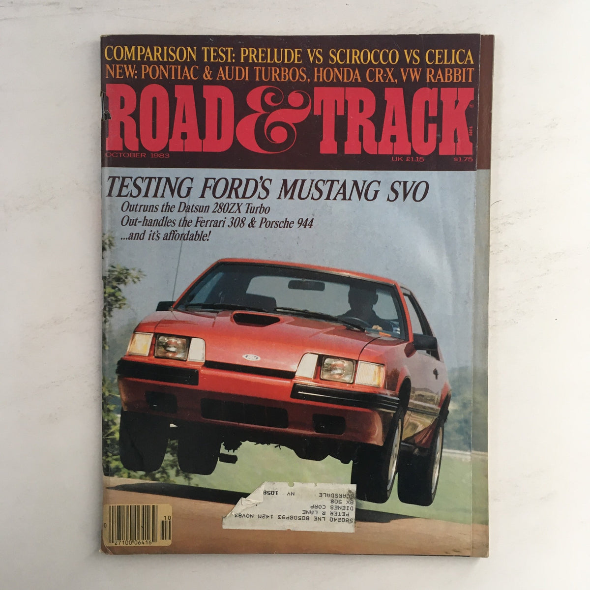 Cover of Road & Track Magazine October 1983 featuring a comparison between Ford Mustang SVO and Datsun 280ZX Turbo, highlighting automotive advancements of the era.