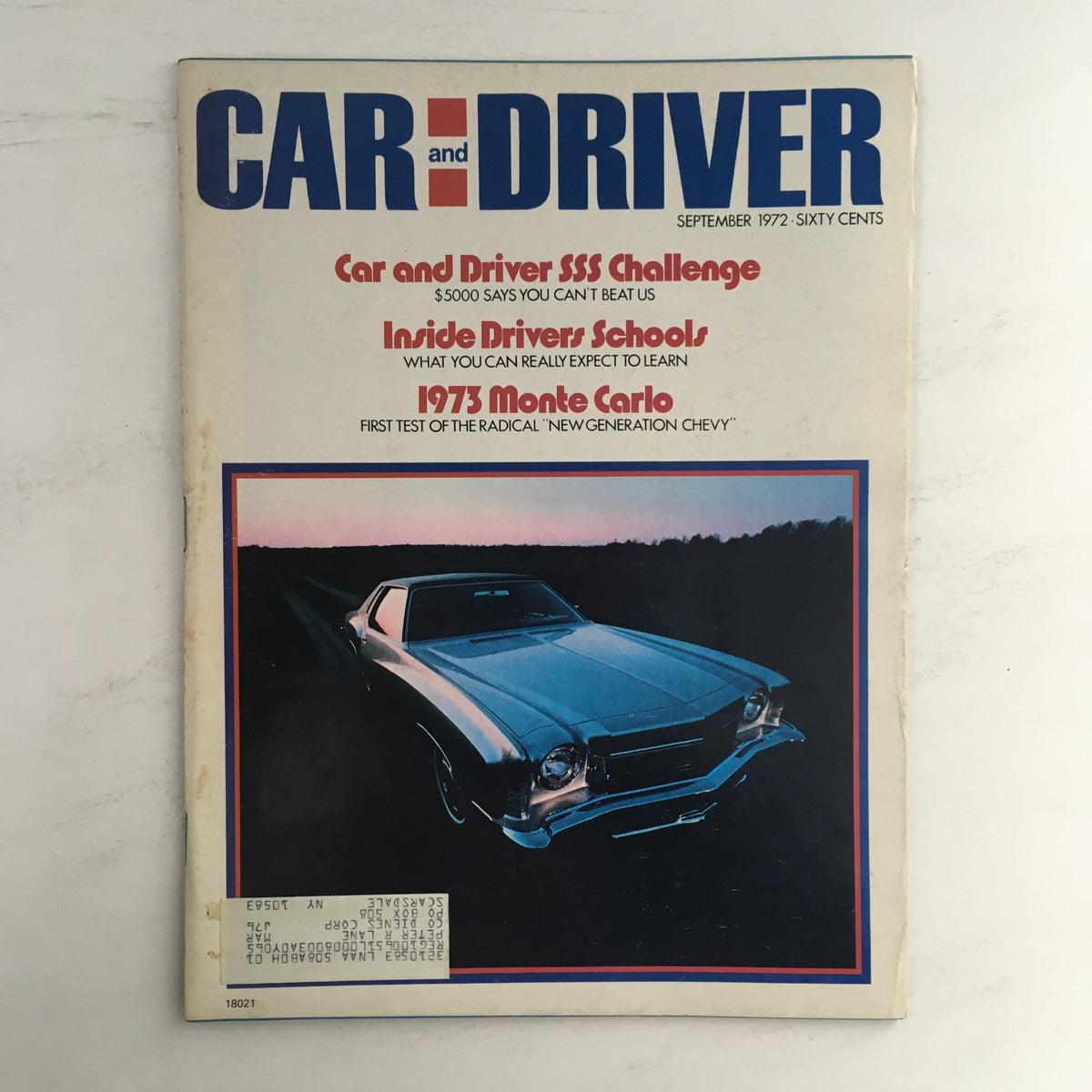 Car and Driver Magazine September 1972 featuring the 1973 Monte Carlo, showcasing the cover design and highlighting its role as a first test of the new generation Chevy.