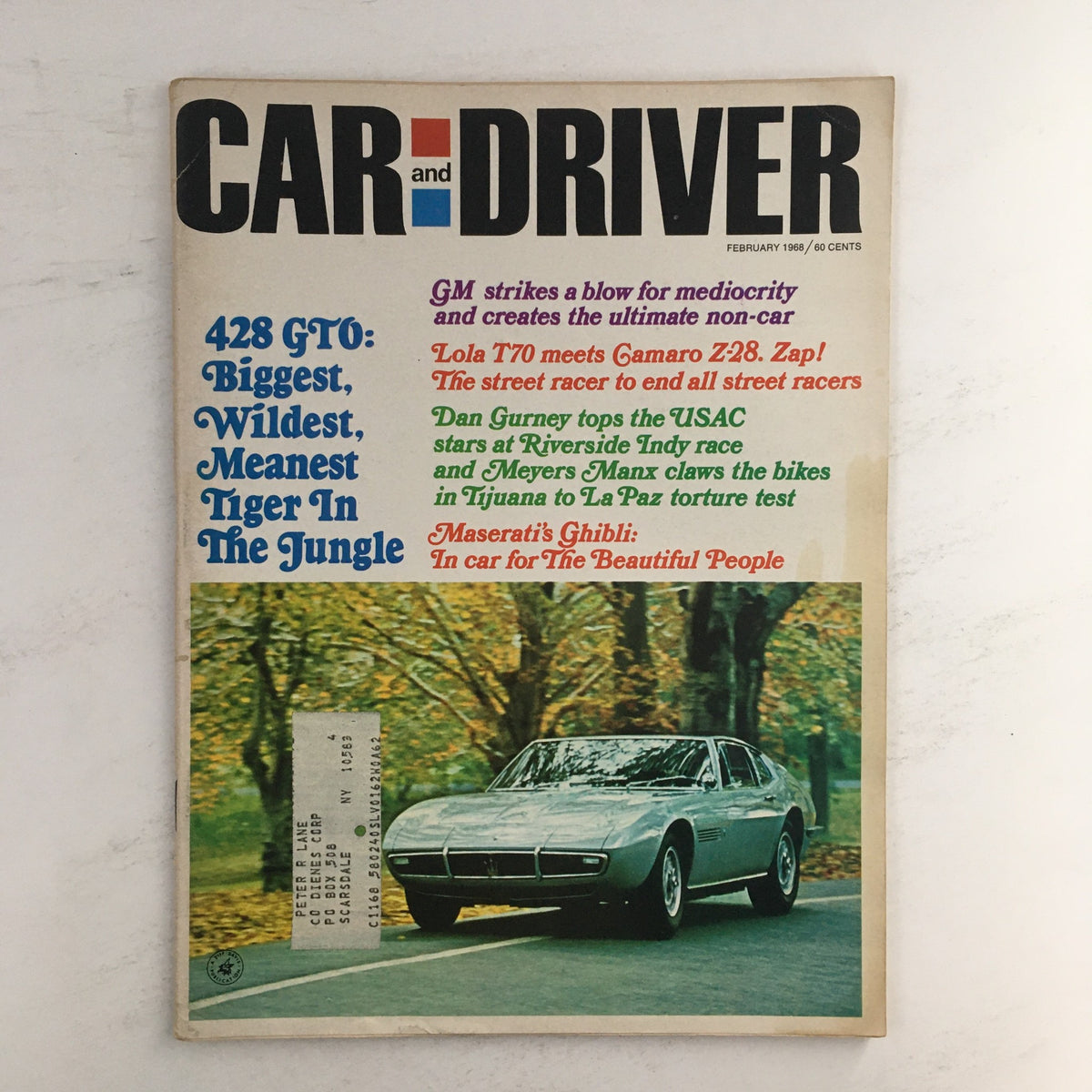 February 1968 issue of Car and Driver Magazine featuring Maserati's Ghibli on the cover, highlighting automotive history with articles about Dun Gurney and USACS racing.