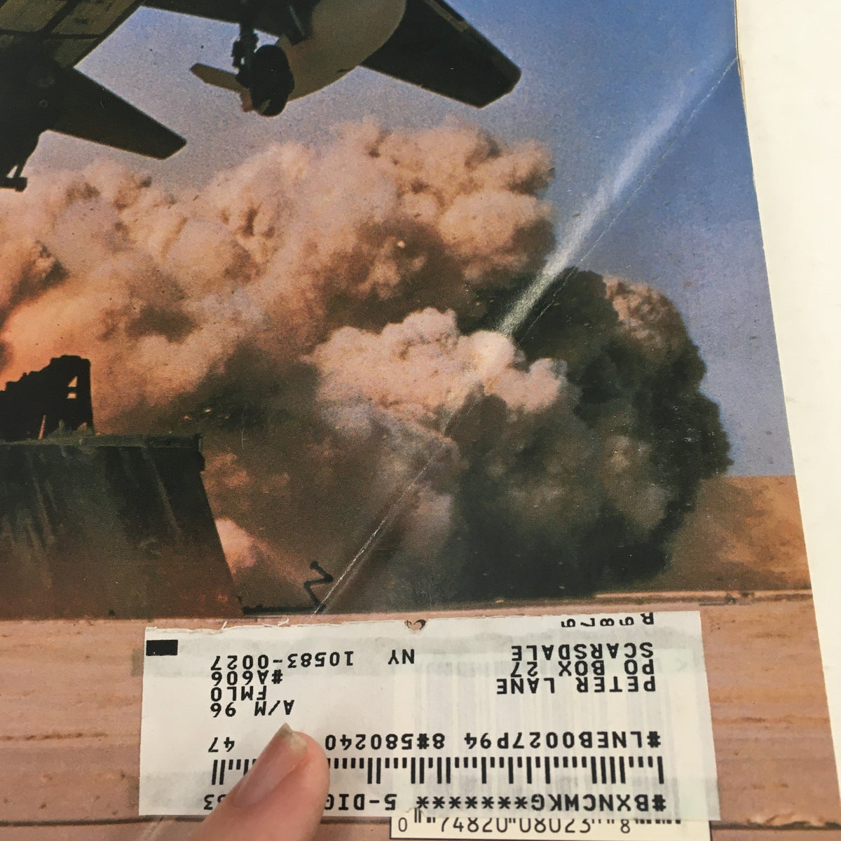 Close-up view of the cover image from Air & Space Smithsonian Magazine November 1995, showcasing a jet in action with smoke in the background, highlighting the article 'Runways of Fire'.
