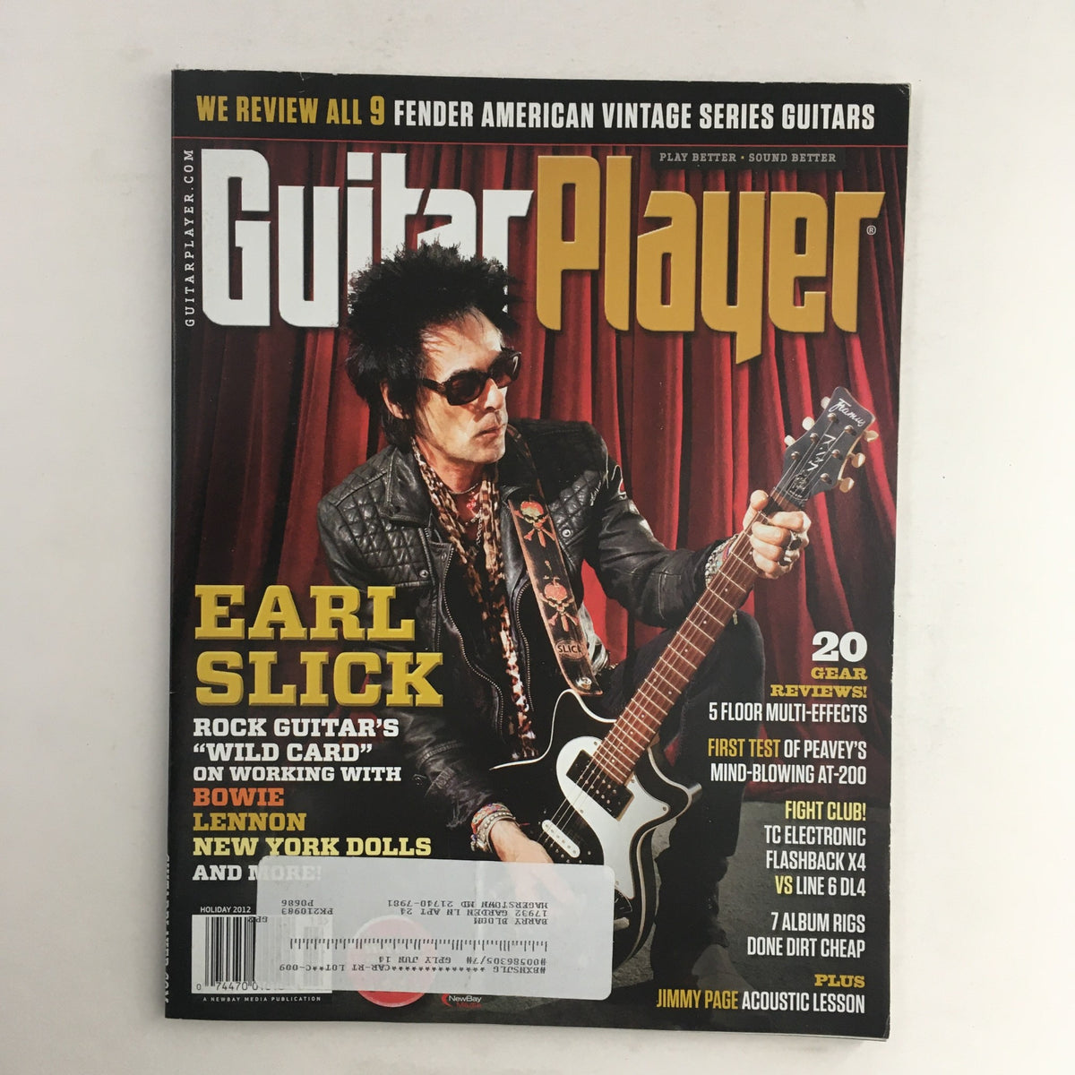 Guitar Player Magazine Holiday 2012 featuring Earl Slick on the cover, highlighting rock legends David Bowie and John Lennon, showcasing notability in vintage music publications.