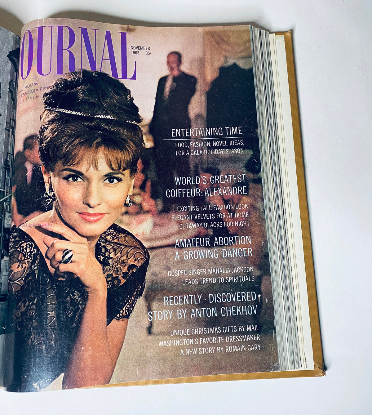 Ladies' Home Journal Library Bound Magazine 1963 Full Year January - December highlighting a sophisticated model in an elegant black dress on the cover of the November 1963 issue.