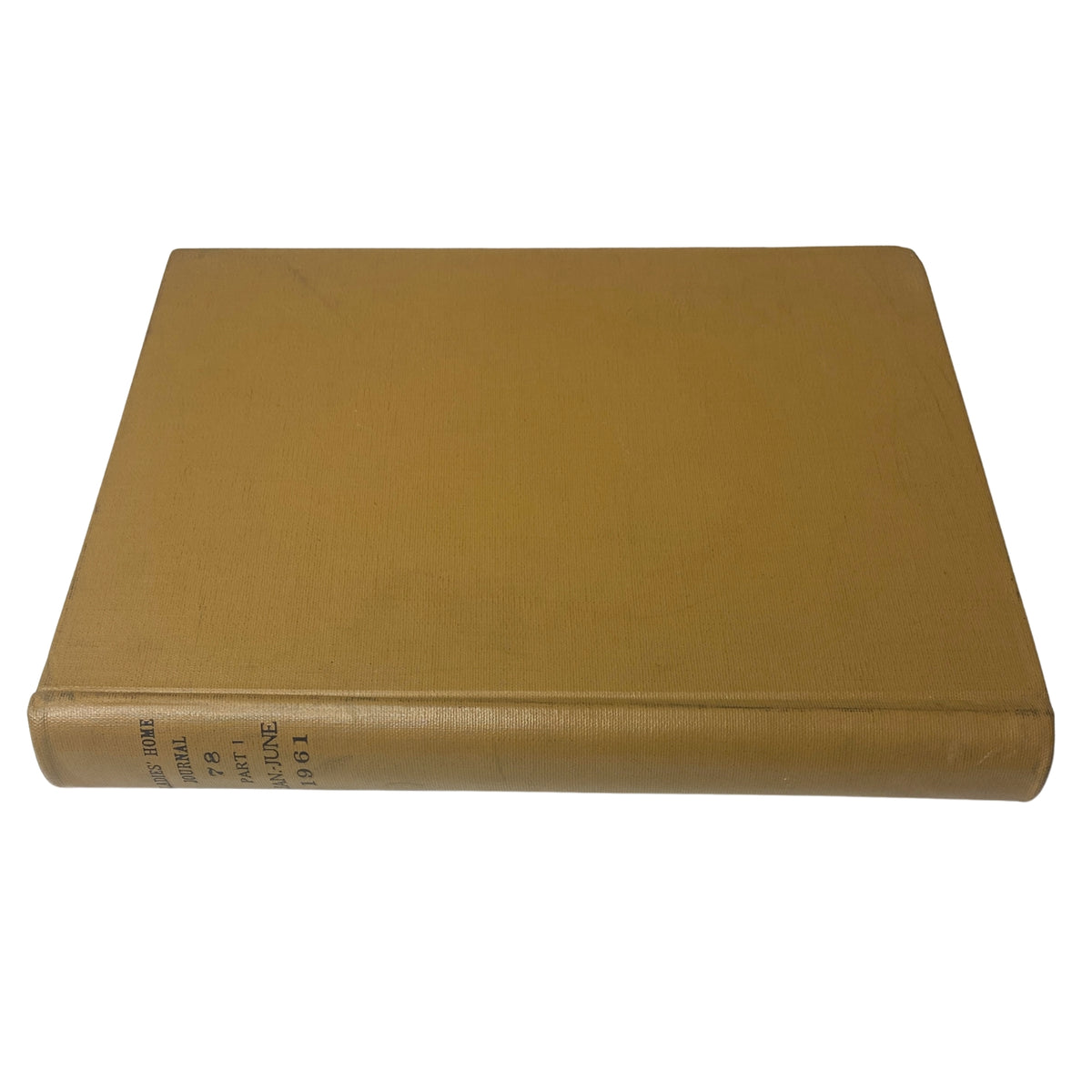 Front view of the Ladies' Home Journal library bound magazine from 1961, highlighting the solid golden cover with no design elements.