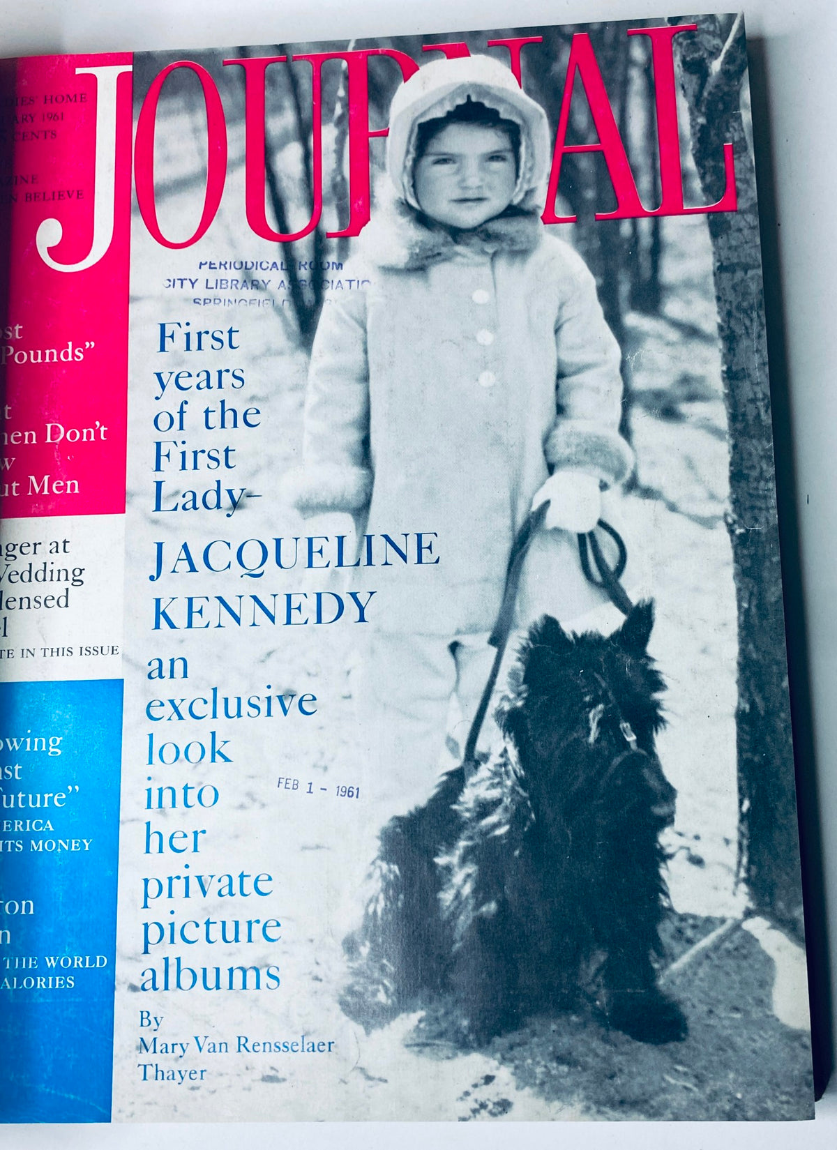 Cover of Ladies' Home Journal Bound Magazine 1961 showcasing a young girl in winter attire with her dog, featured in the February issue about Jacqueline Kennedy.