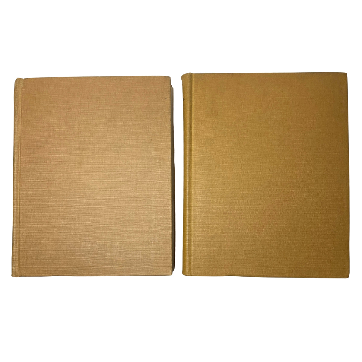 View of both volumes of Ladies' Home Journal Library Bound Magazine 1950, illustrating the solid gold covers.