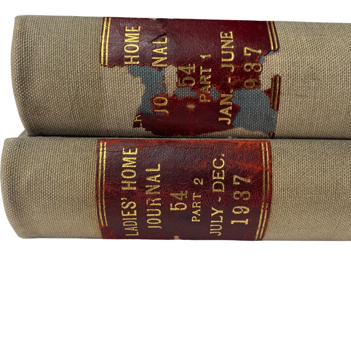 Ladies' Home Journal Bound Magazine 1937 Full Year January - December, highlighting the red and gold spine details of the magazine showing wear, indicating its vintage nature.