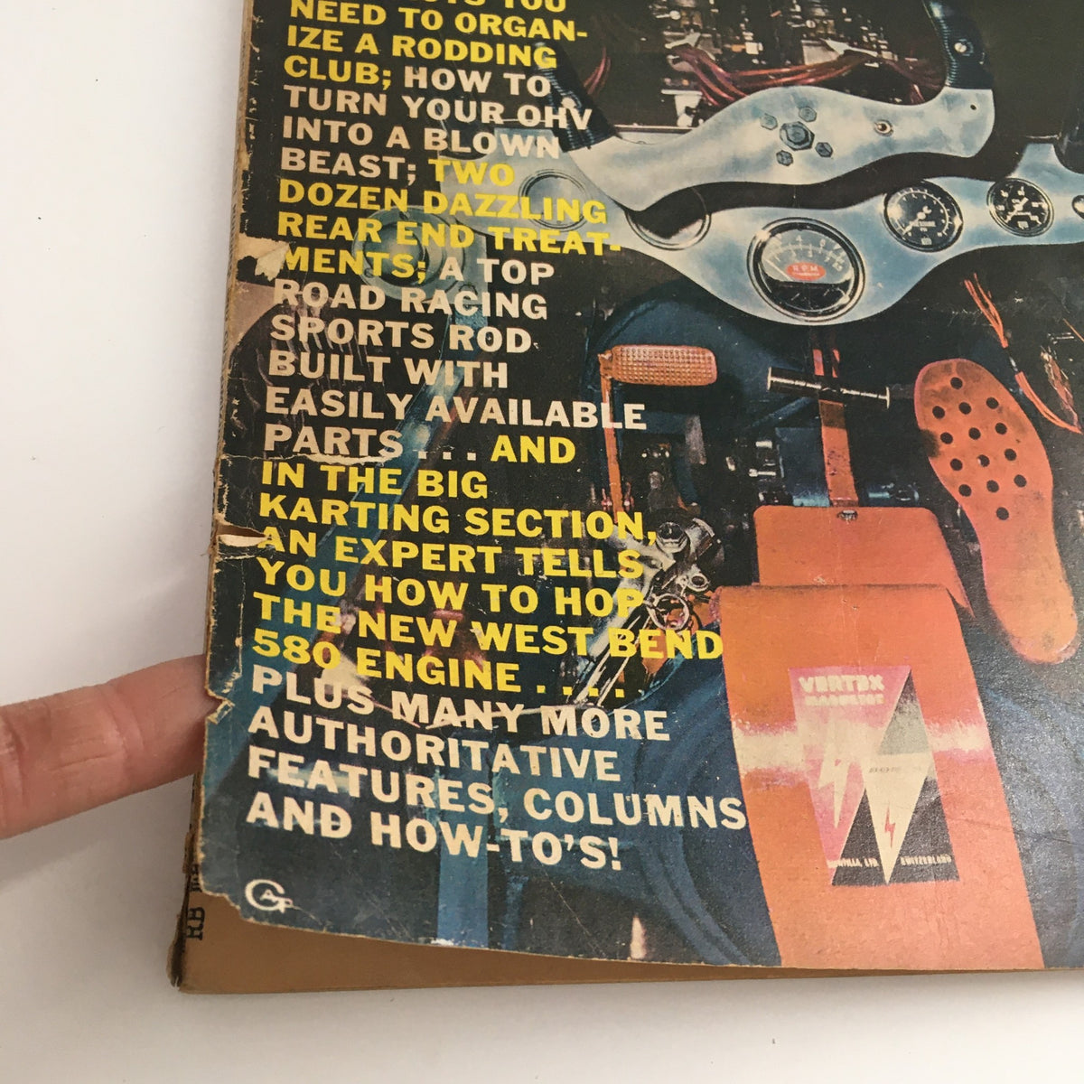 Close-up of the cover of Rod Builder Magazine May 1960 showing detailed content highlights related to building and customizing cars.