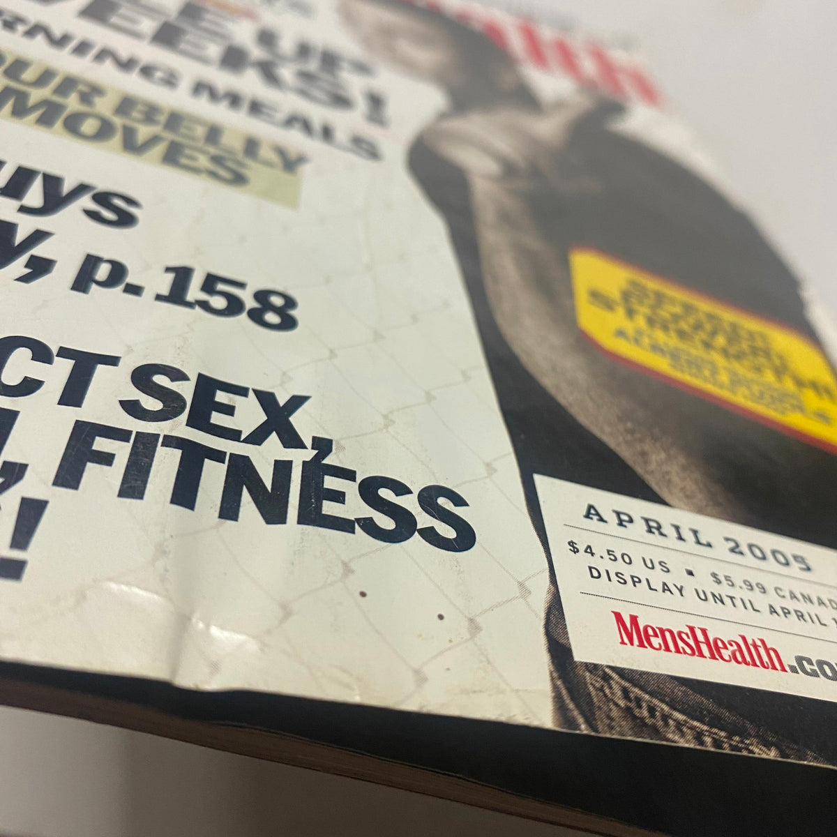 Close-up detail of Men's Health Magazine April 2005 cover, showcasing the features on fat-burning meals, fitness tips, and the title 'Perfect Sex, Fitness!'.