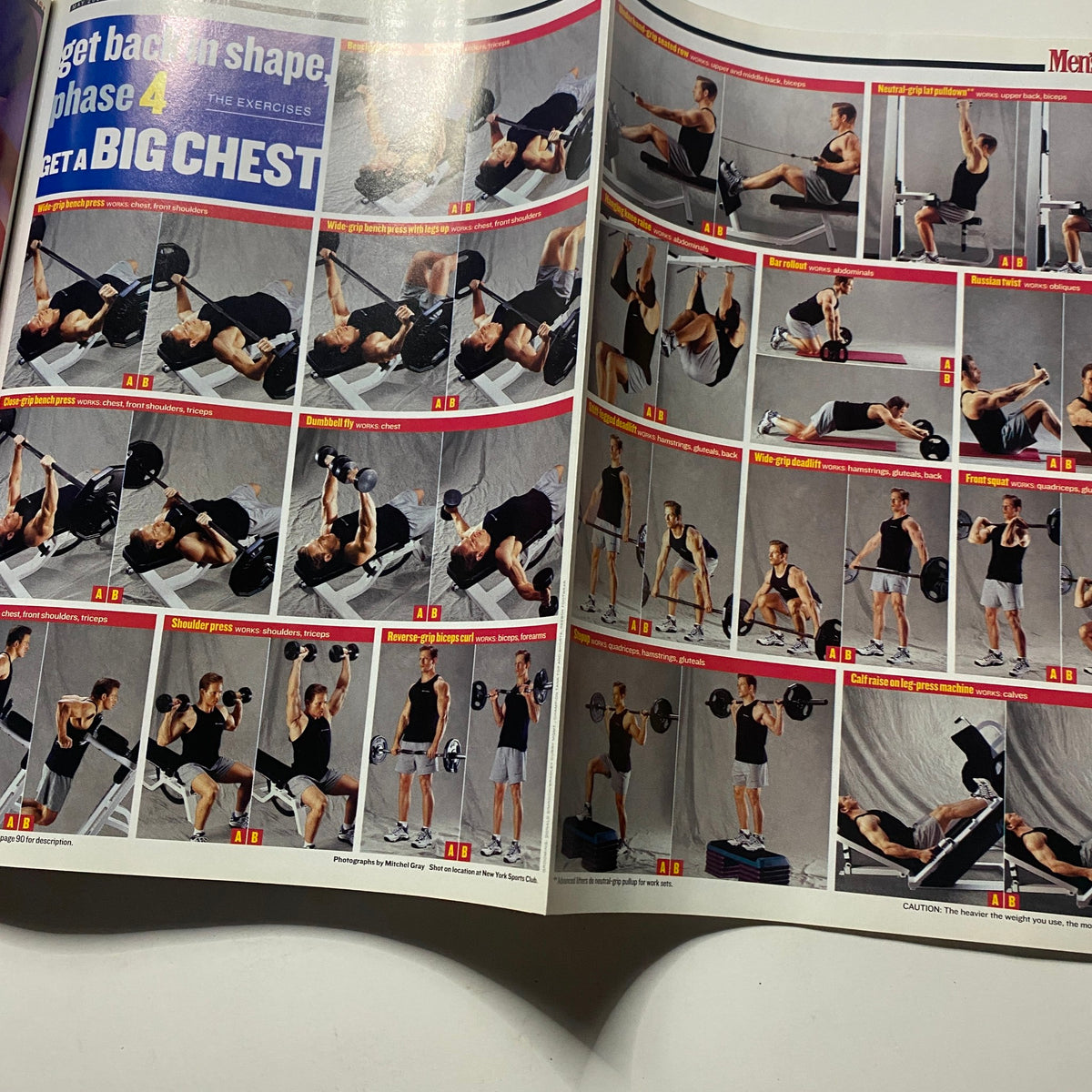 Interior pages of Men's Health Magazine May 2001 showcasing a workout guide with exercises for building a strong chest, featuring illustrative images of men performing strength training and fitness routines.