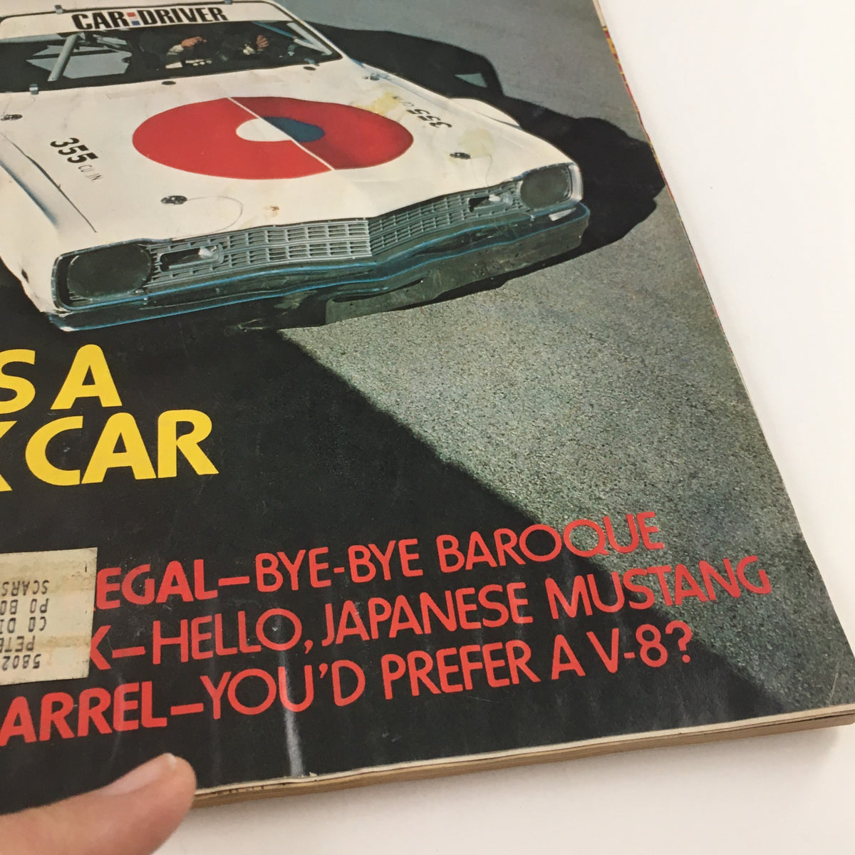 Cover of Car and Driver Magazine May 1976 featuring a stock car with a prominent red circle and text highlighting Dodge's stock car builds.