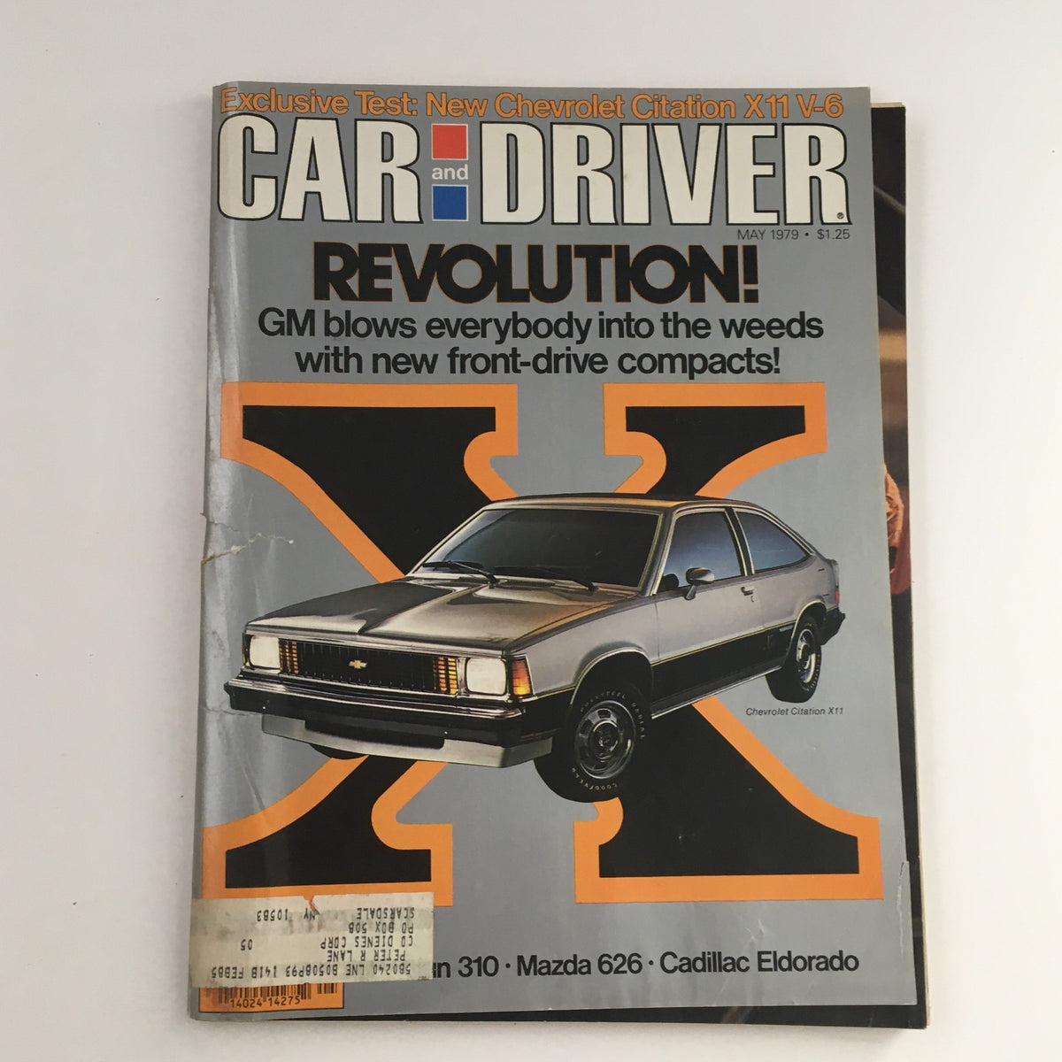 Cover of Car and Driver Magazine from May 1979 featuring the Chevrolet Citation X11, with bold 'REVOlUTION!' text. Highlights the automotive landscape of the late 1970s with models like the Mazda 626 and Cadillac Eldorado.