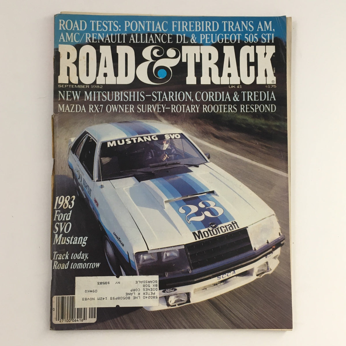 Road & Track Magazine September 1982 featuring the cover story on Pontiac Firebird Trans Am and Ford SVO Mustang, showcasing the vibrant automotive culture of the early 80s.