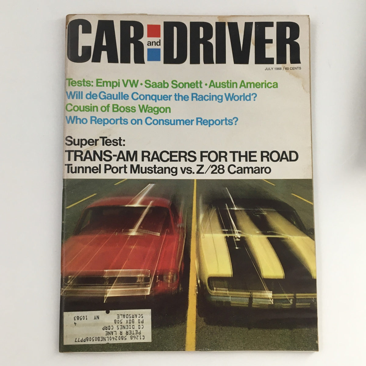 Car and Driver Magazine July 1968 cover featuring Trans-Am Racer Tunnel Port Mustang and Z/28 Camaro, showcasing vintage automotive history.