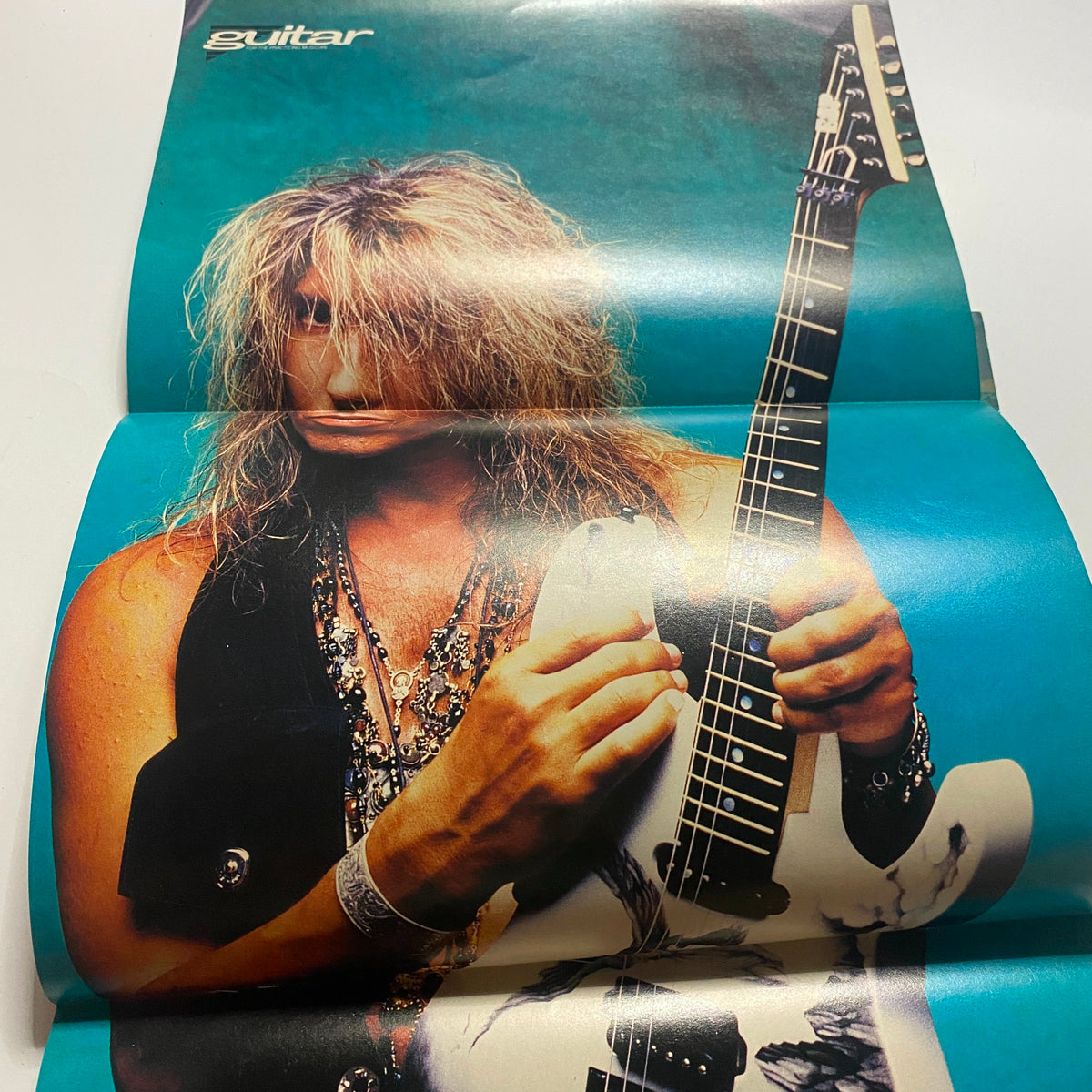 Internal page featuring a prominent guitarist with the Guitar for the Practicing Musician Magazine May 1991 logo, celebrating the musicians of the early '90s rock scene.