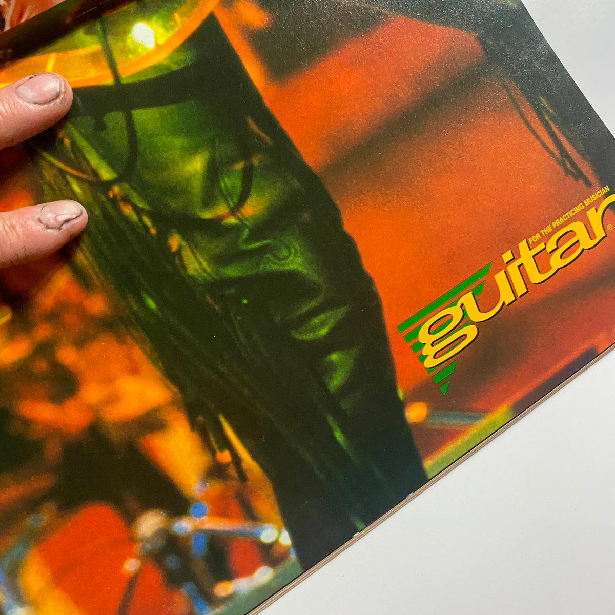 Inside of Guitar for the Practicing Musician Magazine May 1993 displaying a colorful image related to rock culture, with a focus on musical themes.