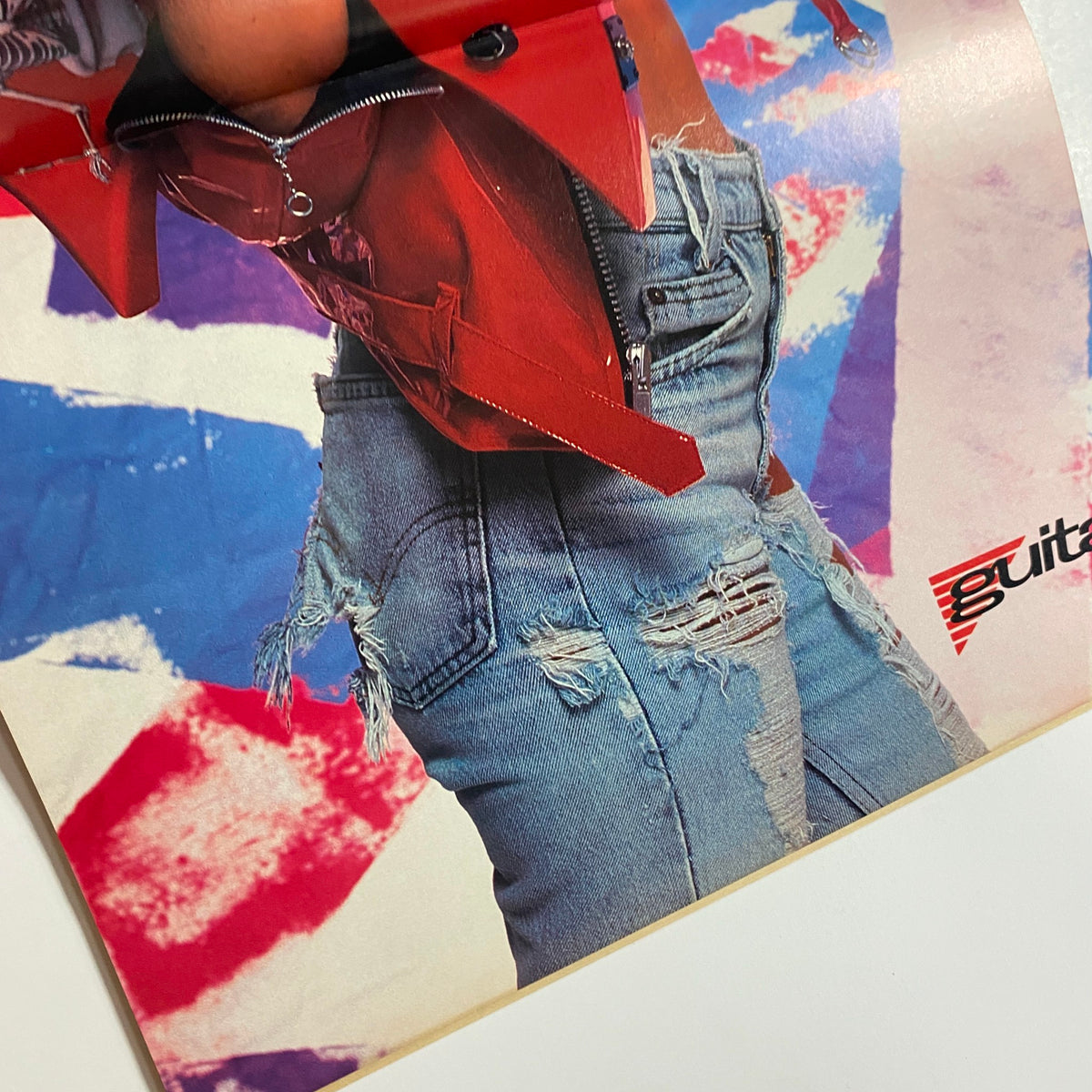 Guitar for the Practicing Musician Magazine July 1988 highlighting a fashionable close-up of a female guitarist's denim ensemble and red jacket, emphasizing the vintage rock style.