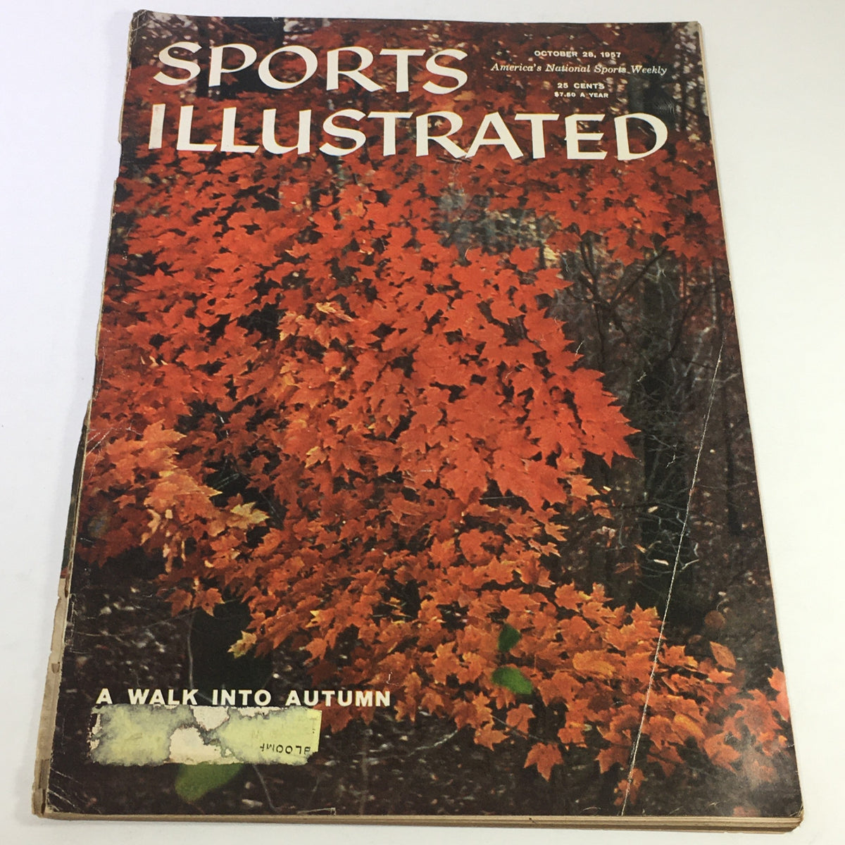 Vintage Sports Illustrated Magazine cover from October 28, 1957, featuring a vibrant autumn scene titled 'A Walk Into Autumn.'