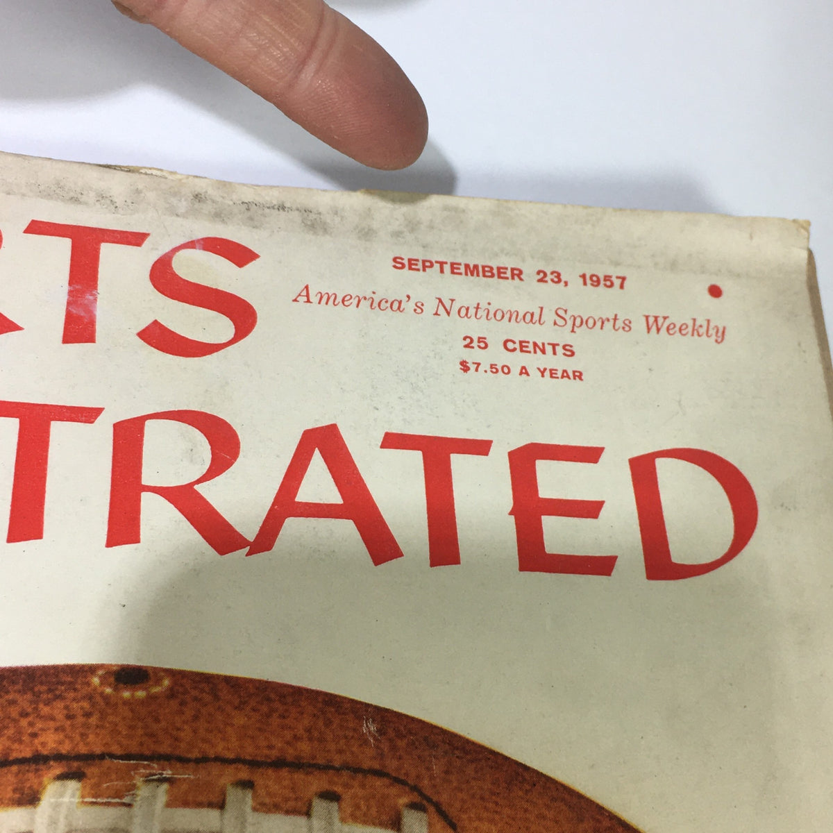 Cover of the VTG Sports Illustrated Magazine September 23 1957, featuring bold red text, the date, and pricing information, showcasing an iconic vintage football theme.