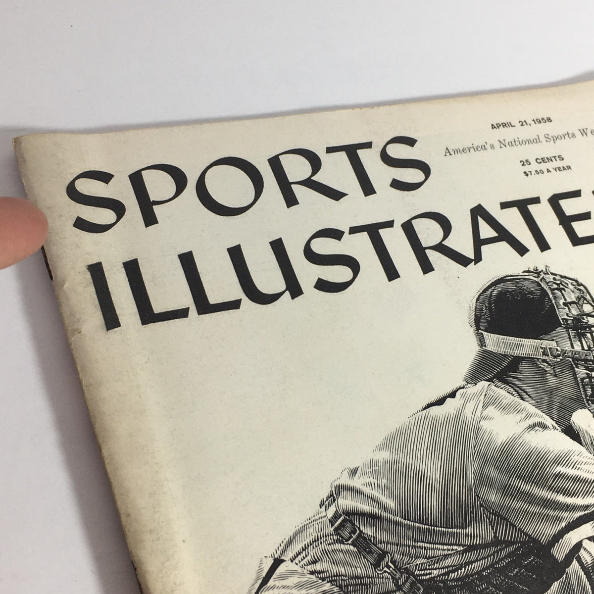 Detailed view of the cover of the VTG Sports Illustrated Magazine April 21, 1958 highlighting a baseball catcher and references to Del Crandall and Cus D'Amato.