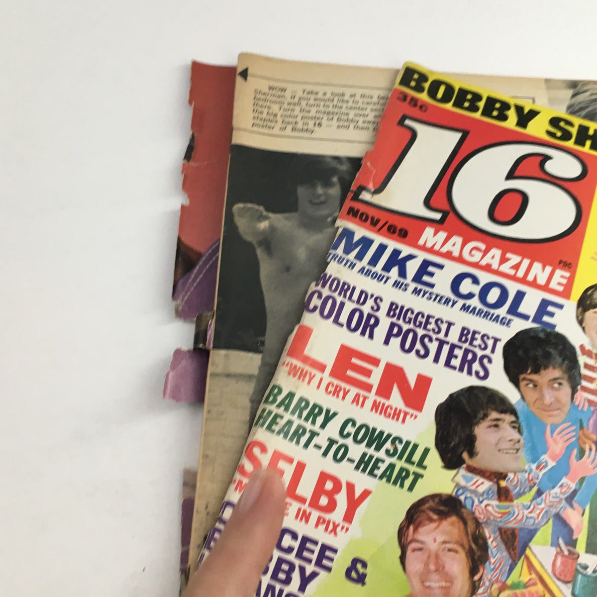 Interior view of 16 Magazine November 1969 showing the cover and age-related wear, emphasizing its collectible status among vintage magazine enthusiasts.