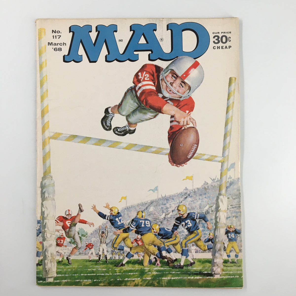 Mad Magazine March 1968 No. 117 cover featuring a humorous illustration of a football player jumping to catch a ball, highlighting the issue's football theme.