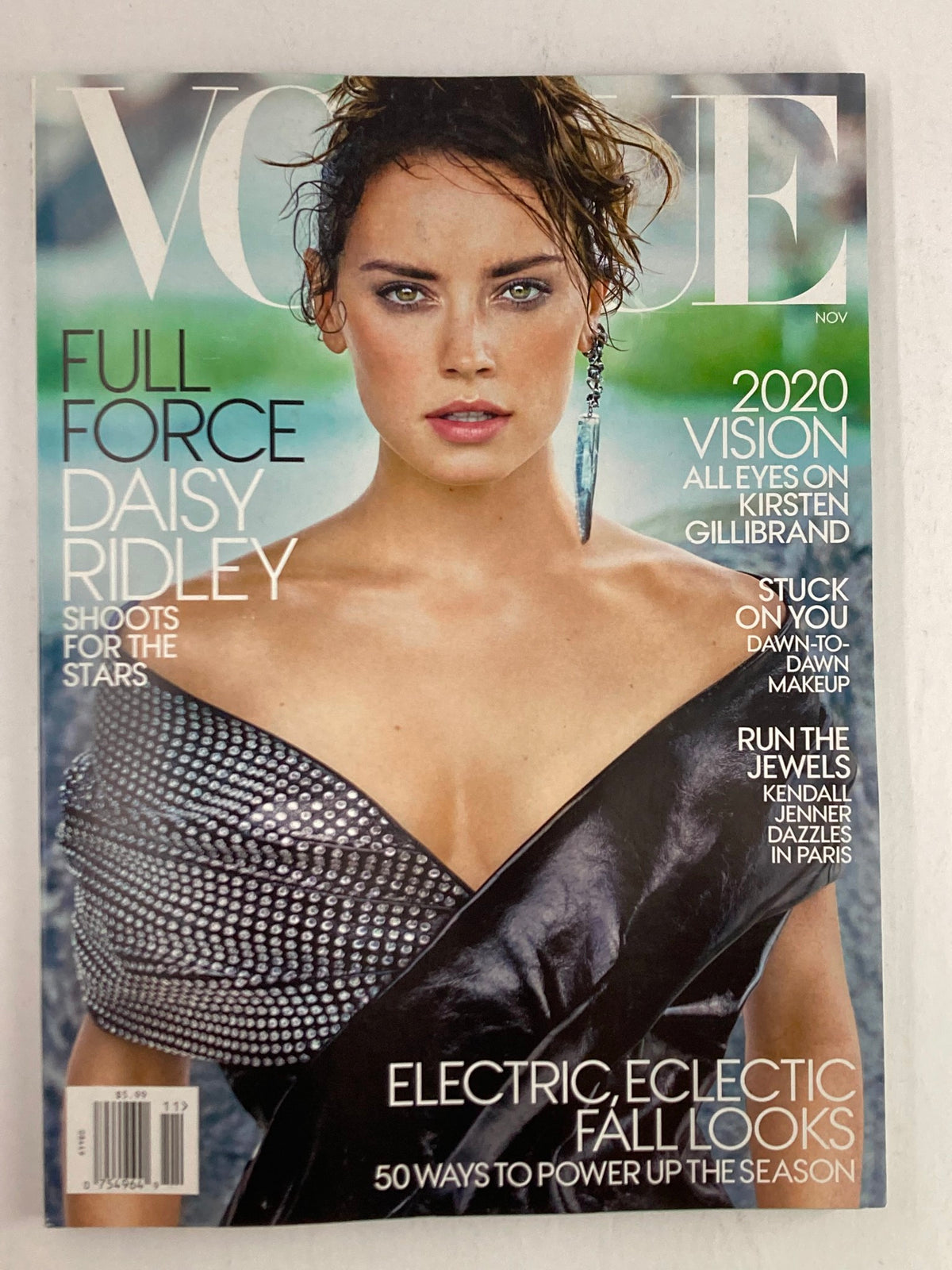 Cover of Vogue Magazine November 2017 featuring Daisy Ridley titled 'Shoots For The Stars' showcasing her in elegant fashion attire.